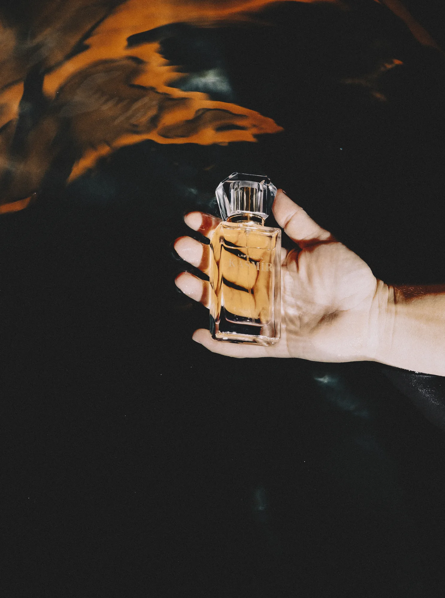Eau de parfum in hand